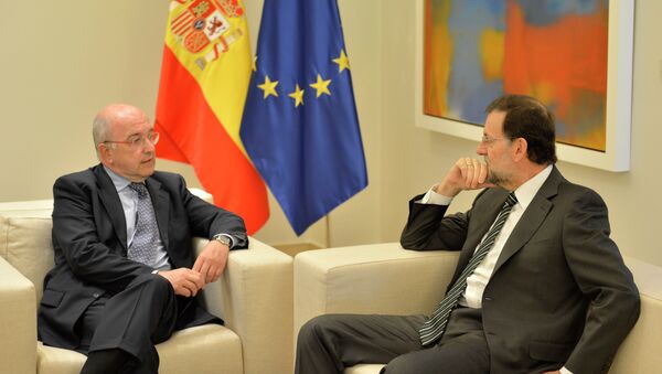 Presidente del Gobierno, Mariano Rajoy y vicepresidente de la Comisión Europa y comisario de Competencia, Joaquín Almunia - Sputnik Mundo