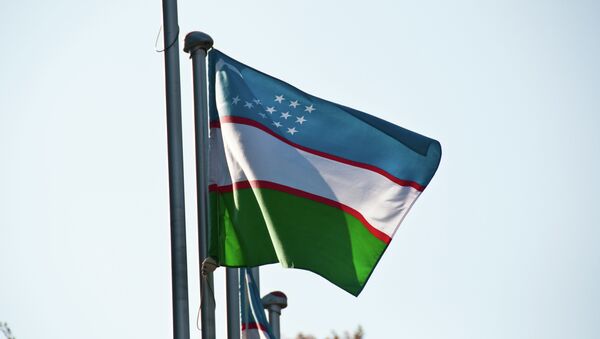 La bandera de Uzbekistán - Sputnik Mundo