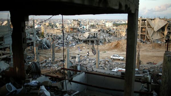 Ruinas de las casas en el este de la ciudad de Gaza, 01 de diciembre 2014 - Sputnik Mundo