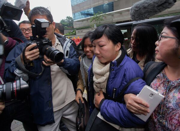 Una criada indonesia denuncia las torturas sufridas en Hong Kong - Sputnik Mundo