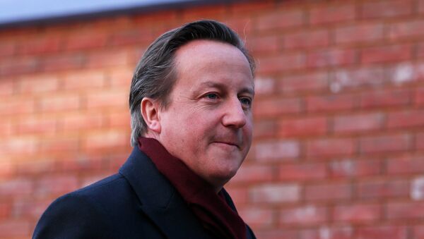 Britain's Prime Minister David Cameron arrives for his visit to the Harris City Academy in south London December 8, 2014. - Sputnik Mundo